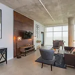Gaze At Sprawling Green Vistas Through Walls Of Windows